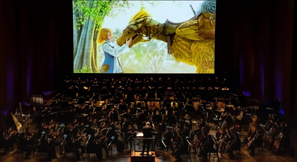 Now the theaters are full of concerts with soundtracks, including videogames: it all started with Morricone